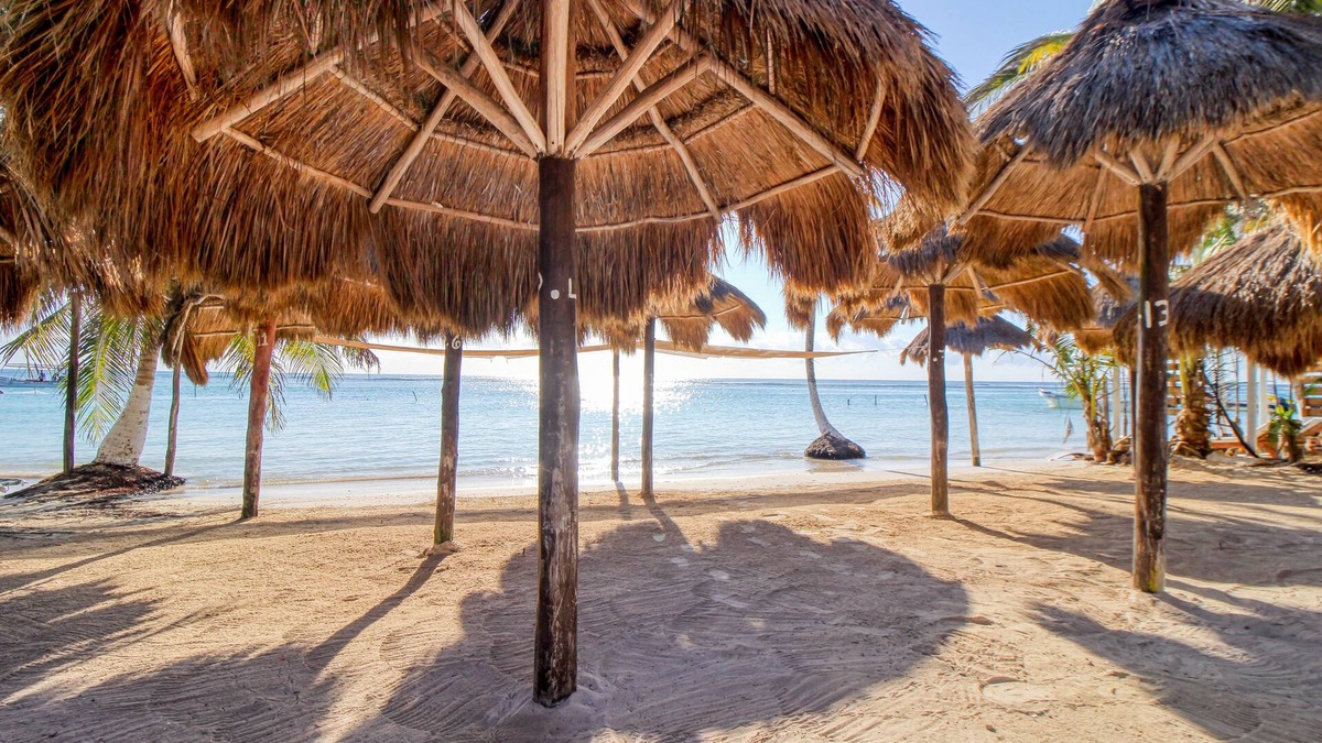 Majahual House | Spanish-style home with pool, W/D, 2 living areas & 2 kitchenettes - near beach