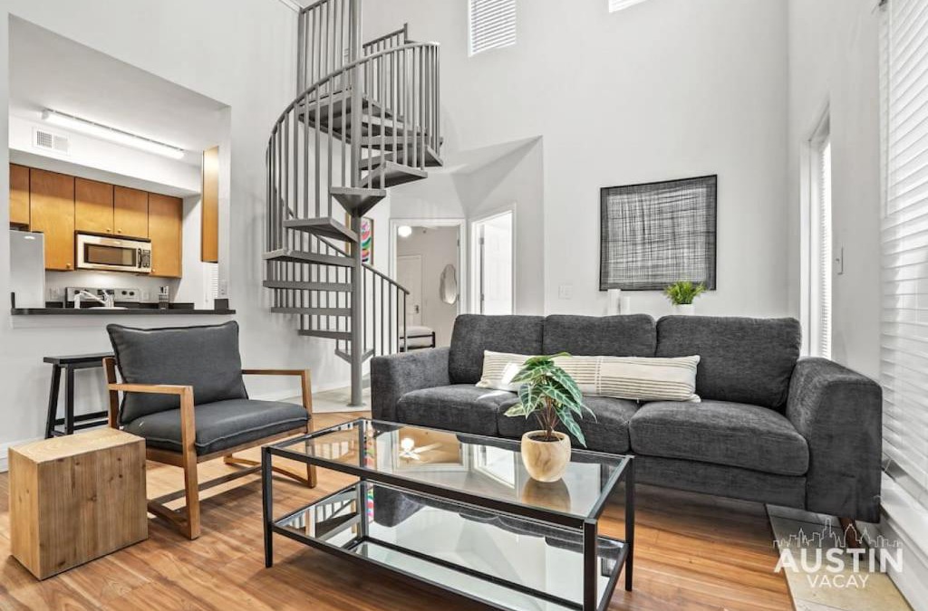 West Campus Apartment | Spiral Stairs to Loft Bedroom Balcony with Shade