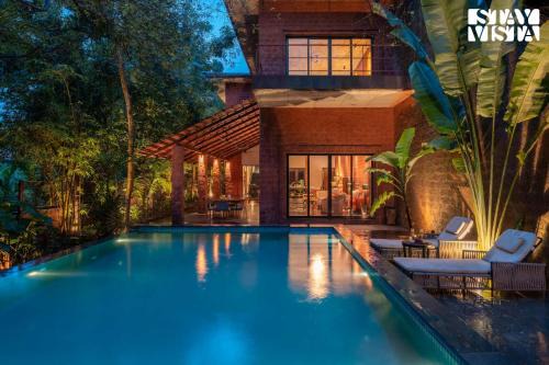 Moira Villa | StayVista at Moira by the River with Bonfire, BBQ