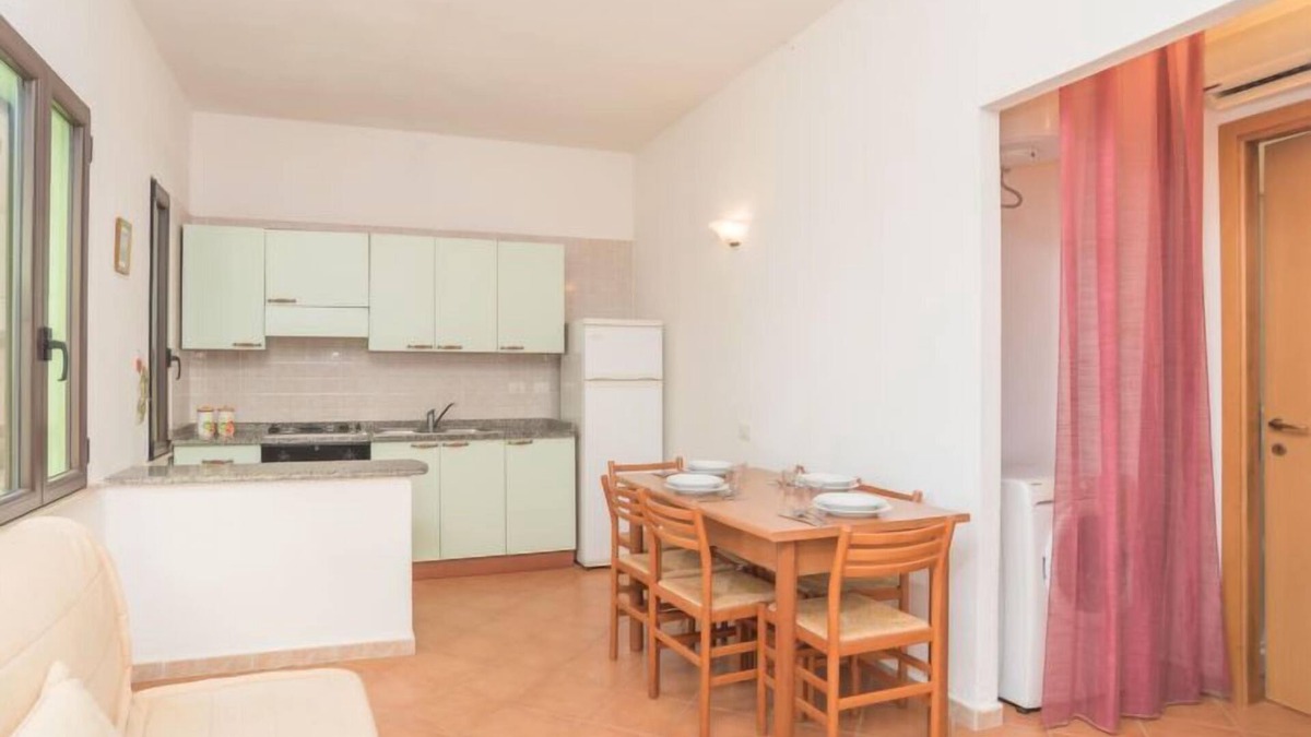 Costa Rei Apartment | Stella con piscina comune (REI100) by Interhome