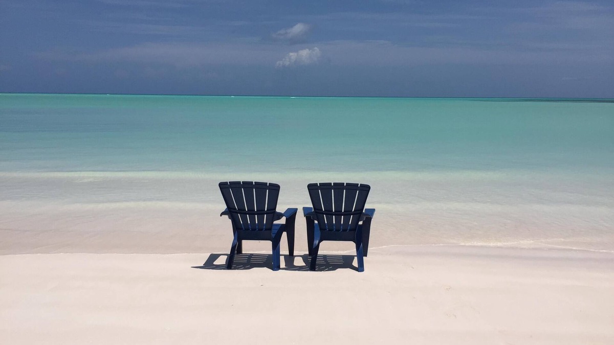 Spanish Wells House | Step from your porch onto the soft white sand & crystal clear water.