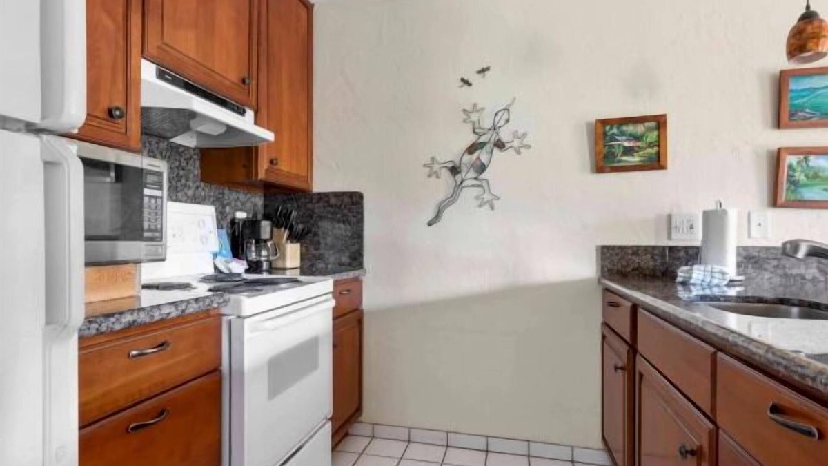 Wailua House | Steps from the Ocean! 4 Stunning View Suites | Balcony and Kitchen + 3 Pools