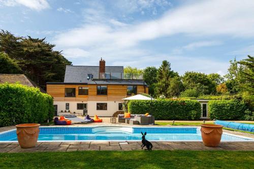 Chichester House | Stunning 5BR Home with Pool - 5 min to Beach