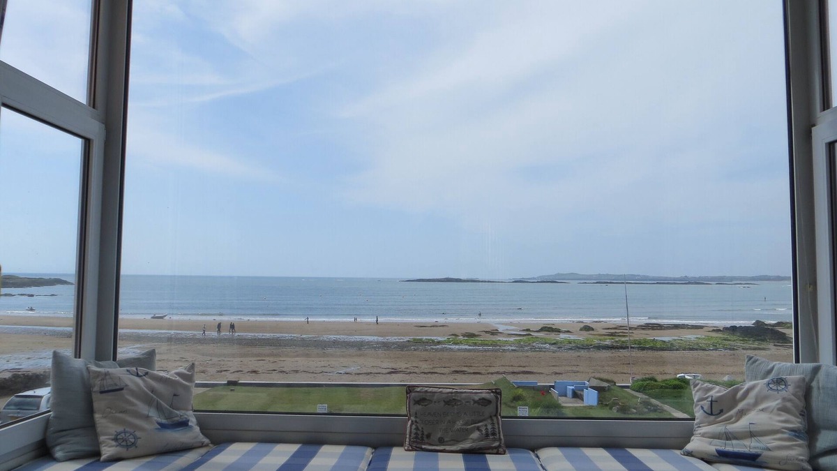 Rhosneigr House | Stunning bay views and sunsets seen from all main rooms. Games room. Wetroom.