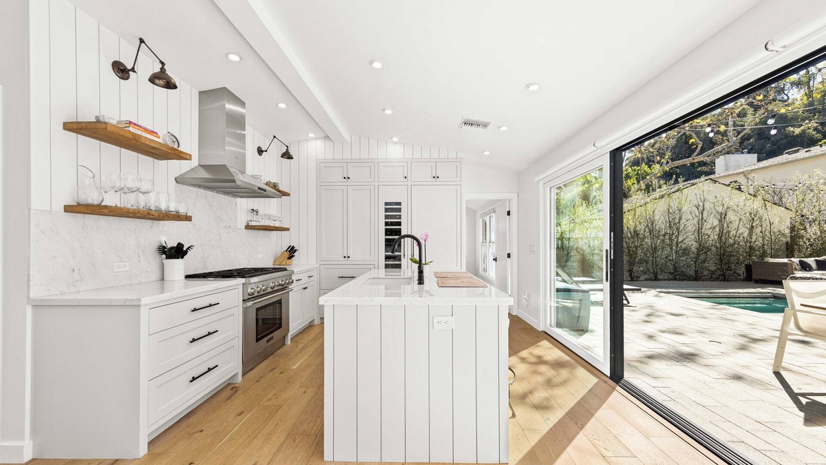 Beachwood Canyon House | Stunning compound w/pool house features quintessential LA indoor/outdoor living