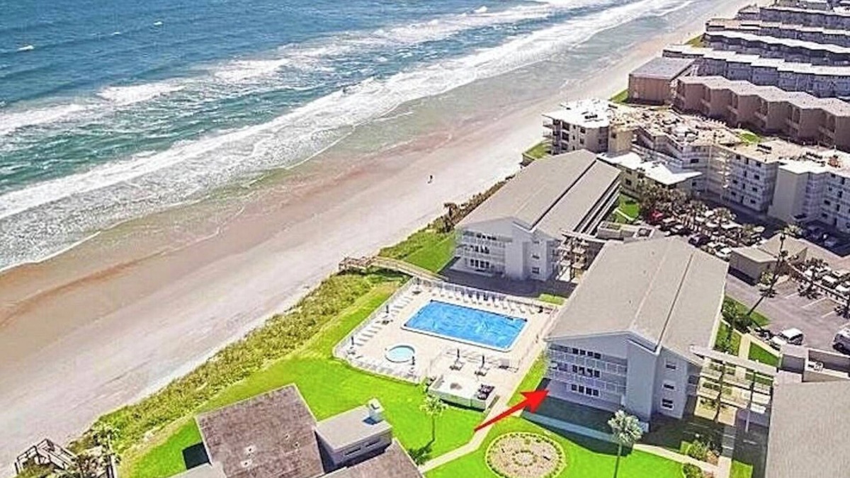 New Smyrna Beach Condo | STUNNING ground floor condo, direct OCEAN front, steps to community pool!