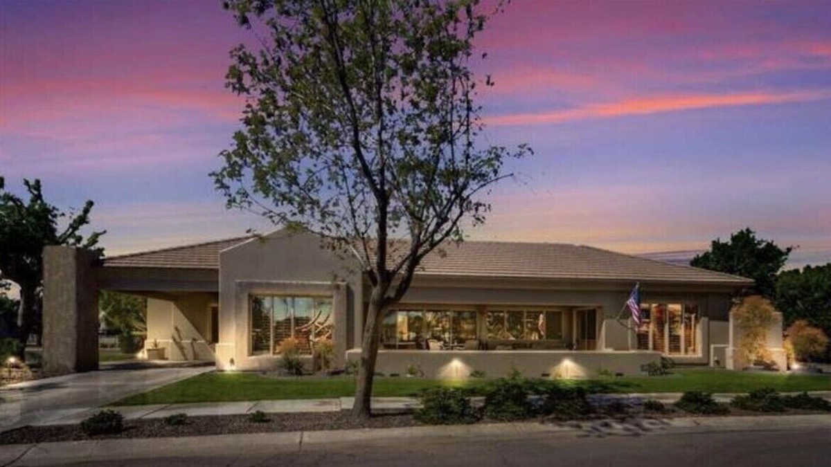 Val Vista Lakes House | Stunning lake view home with oversized jetted spa
