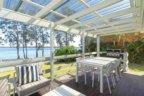 Budgewoi House | Stunning Lakefront Home with Bonus Studio
