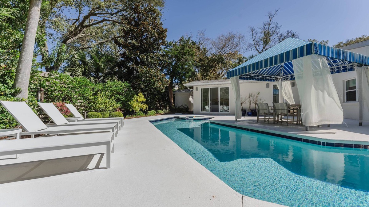 East Beach House | Stunning one-level, 5 bedroom East Beach home with heated pool & spa