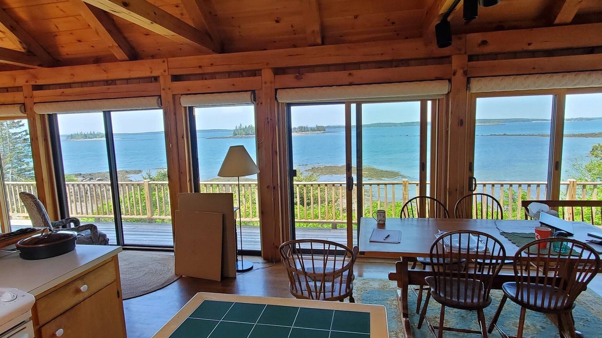 South Addison Cottage | Stunning sunset views from this adorable oceanfront cottage