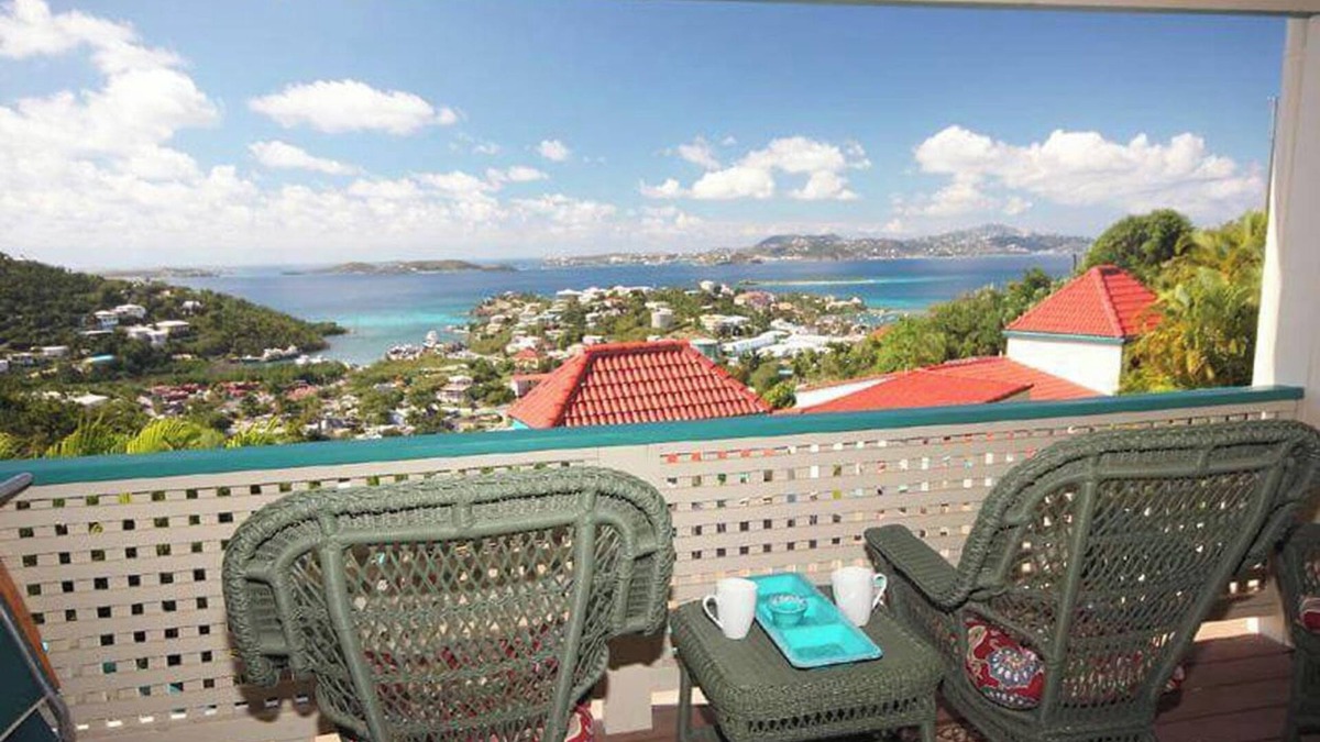 Estate Enighed Condo | Stunning Sunsets, Modern A/C, & Updated Living – Your Dream Condo Awaits!