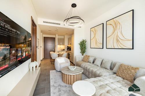 Nad Al Sheba Apartment | Stylish 1BR with City and Partial Burj View by BMS