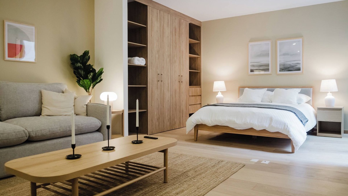 Cuauhtemoc Apartment | Stylish and cozy loft just one block from Roma Norte. Enjoy a comfy bed, smart TV, full kitchen, and fast Wi-Fi. The building features a rooftop pool with stunning views, gym, co-working area, and kids’ playroom.