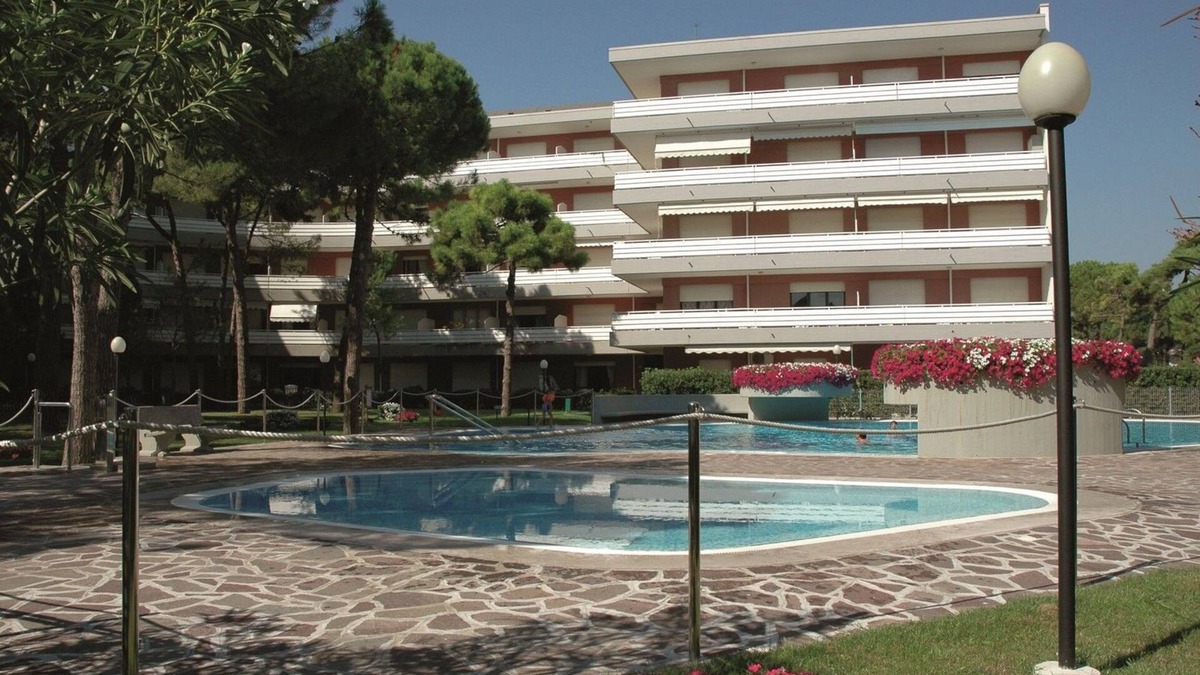 Lignano Riviera Apartment | Stylish apartment with pool access by Beahost Rentals