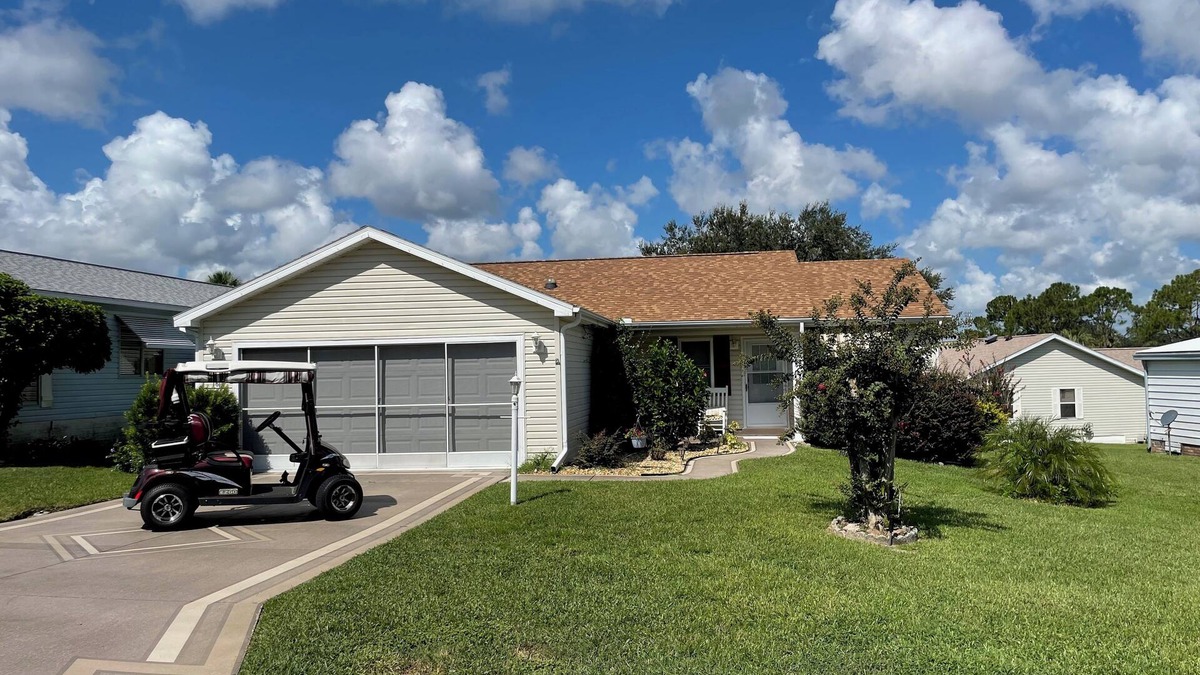 The Villages House | Sunlit retreat overlooking championship fairways—your Florida oasis awaits!