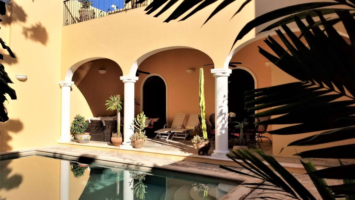 Costa House | Sunny, warm two-story colonial home located just one block from parque Santa Lucia,
