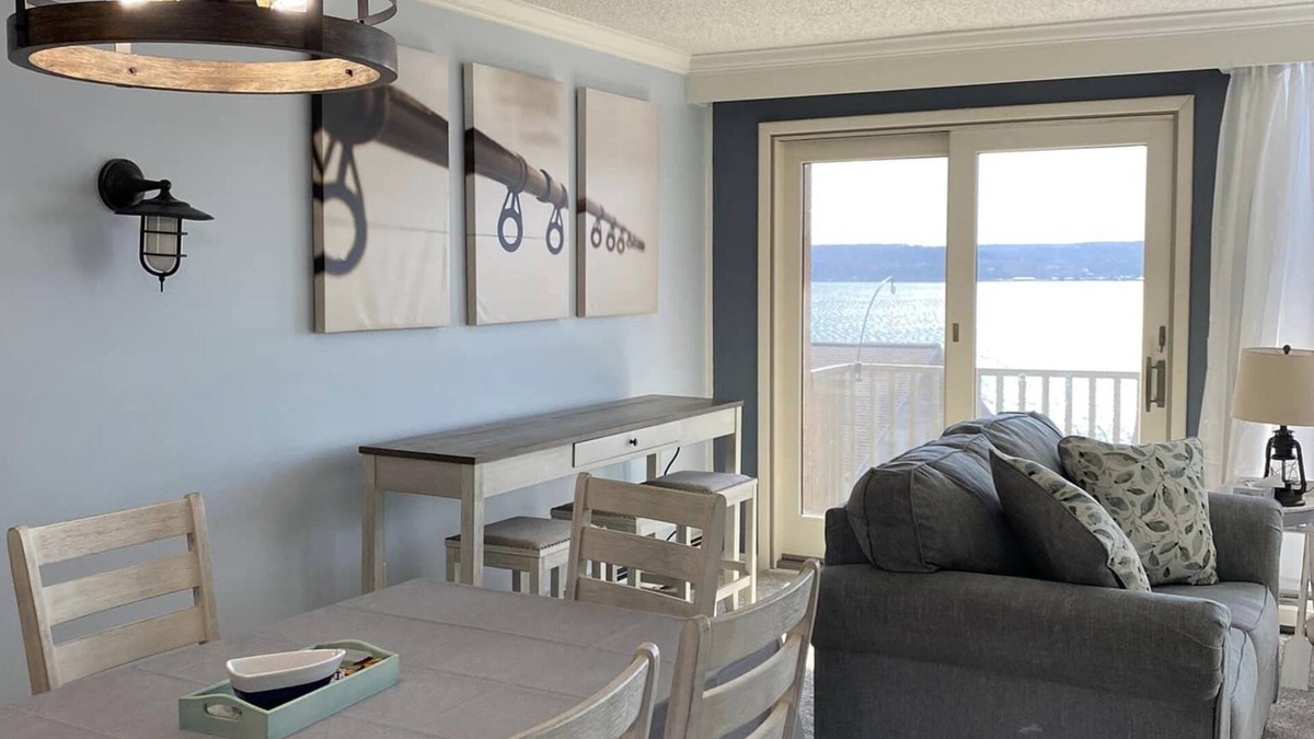 Dewittville Condo | Sunset Shores Family-Friendly Lake Condo in Mayville Pool, AC, Private Deck!