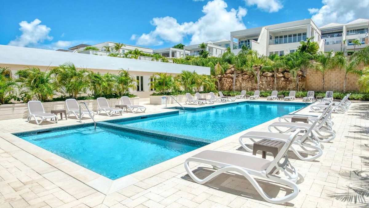 Merlin Bay Cottage | Superb luxury 1-bedroom cottage in gated community with pool and gym