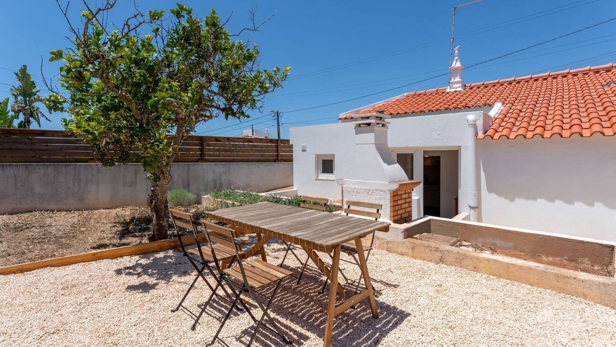 Espiche House | Sweet 2 BDR House With Patio by LovelyStay