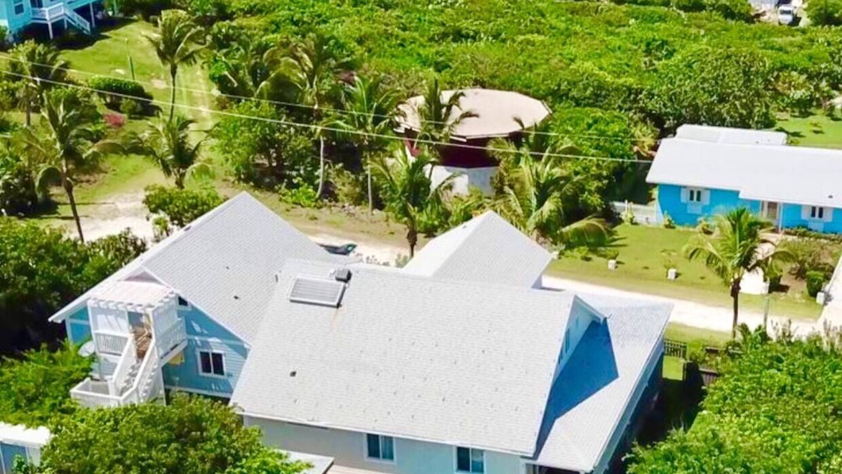 Rainbow Bay House | Sweet Merlot - A Family Rental with a Pool & walking distance to Twin beach