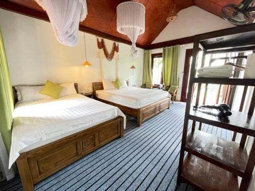 Hoa Lu Cabin | Tam Coc Camellia Garden Homestay