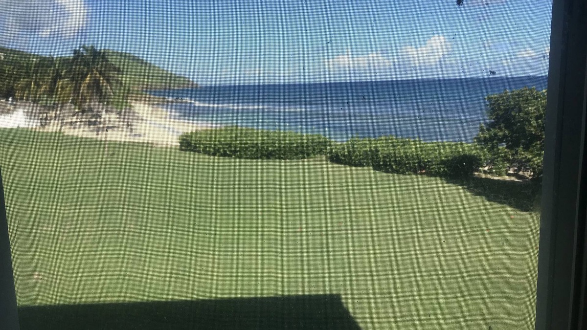 Estate Sion Farm Condo | THE BEST OF GENTLE WINDS. Luxurious unit overlooking the beach.