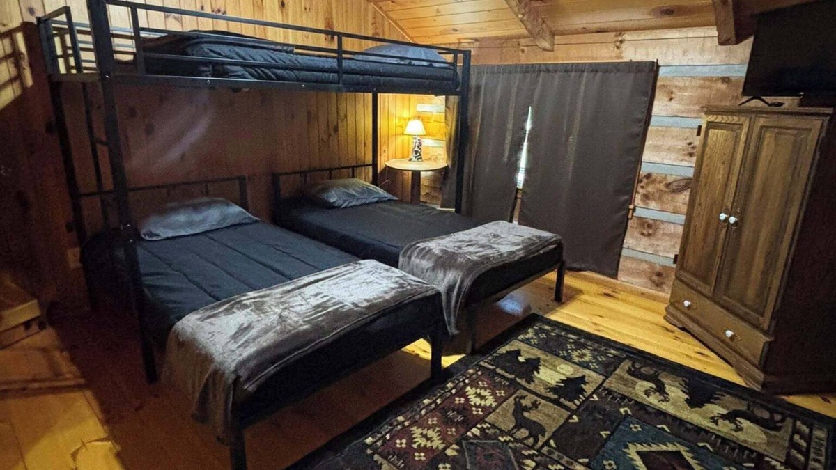 Lansing Cabin | The Boatright Retreated nestled on the river.