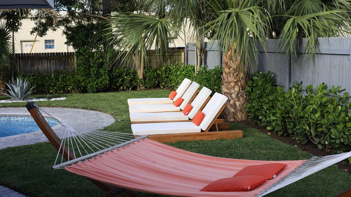 West Palm Beach Villa | The Coral Villa - Heated Pool Spa and Lush Garden