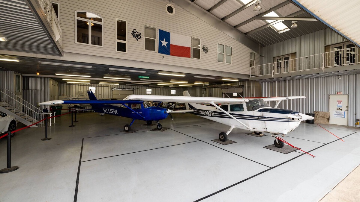 Haslet House | The Hands Down COOLEST Stay in Fort Worth - Active Airplane Hangar