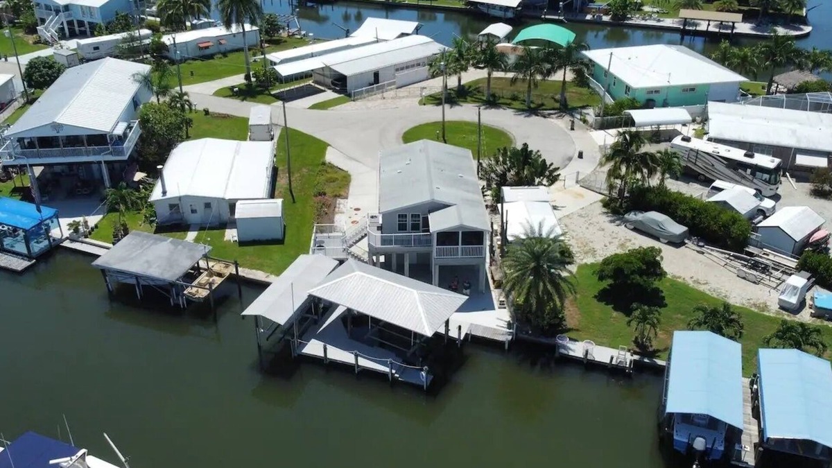 Saint James City House | The Hook Oar House - Waterfront Retreat with Private Boat Lifts - 2B/2B