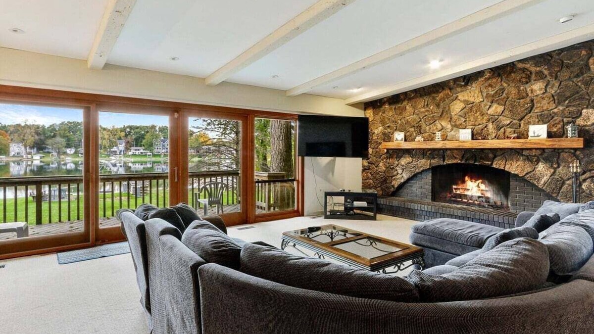 Powers Lake House | The Lake House on Powers |Grassy Frontage |Lakeside Deck |Rec Room w/Pool Table & Bar |Fire Pit