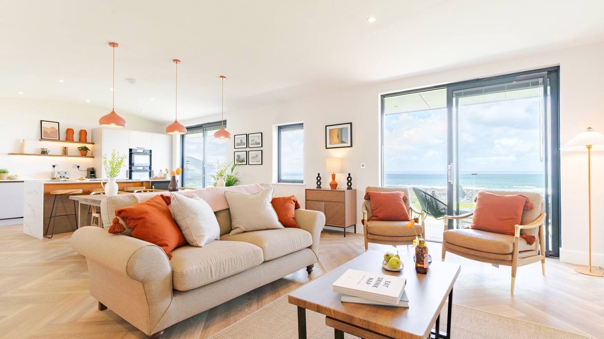 Widemouth Bay House | The Lighthouse is an end of terrace four bedroomed seafront retreat with a hot tub and incredible vi
