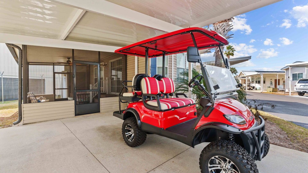Upper Grand Lagoon House | The Little Love Bug: 2-pup friendly, golf cart, screened porch, near beach/pool