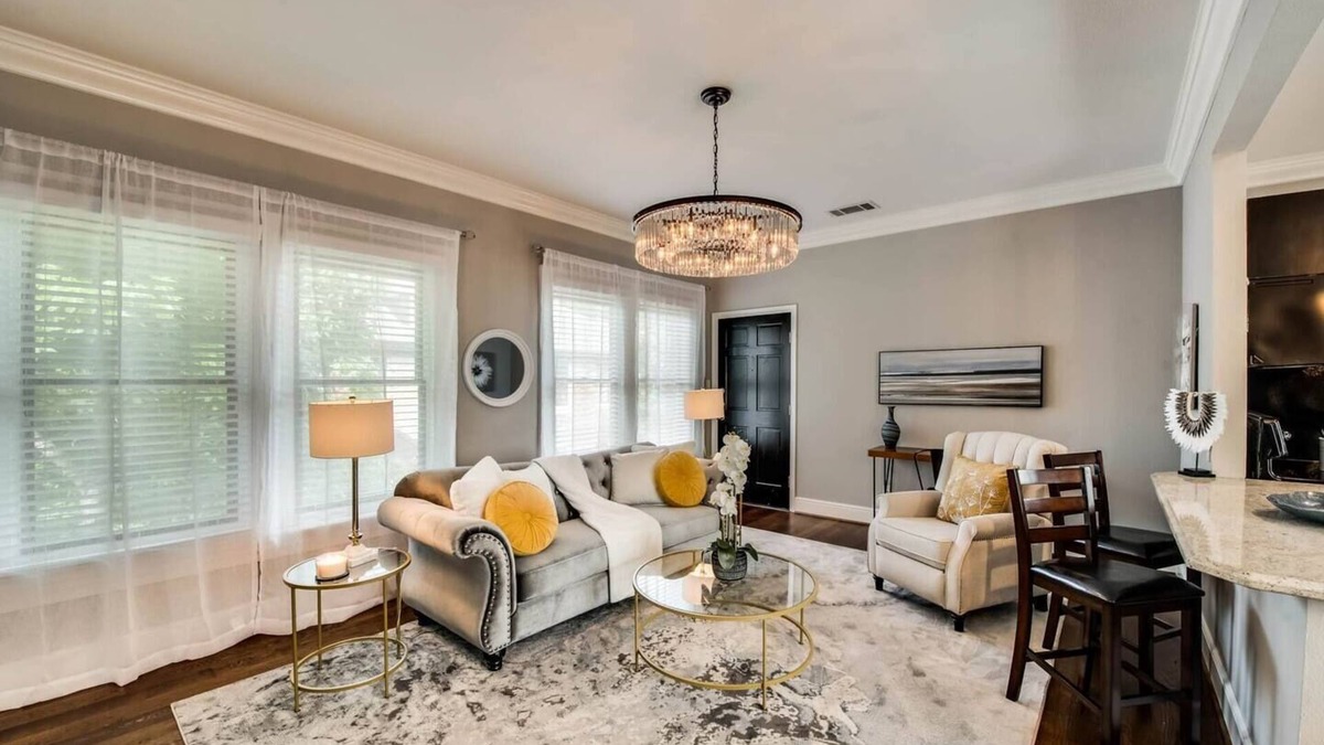 Old East Dallas Condo | The main living area includes a spacious living room, dining area, and spa-inspired bathroom. Guests enjoy complimentary high-speed WiFi, washer/dryer, and all essential amenities for comfort and convenience.