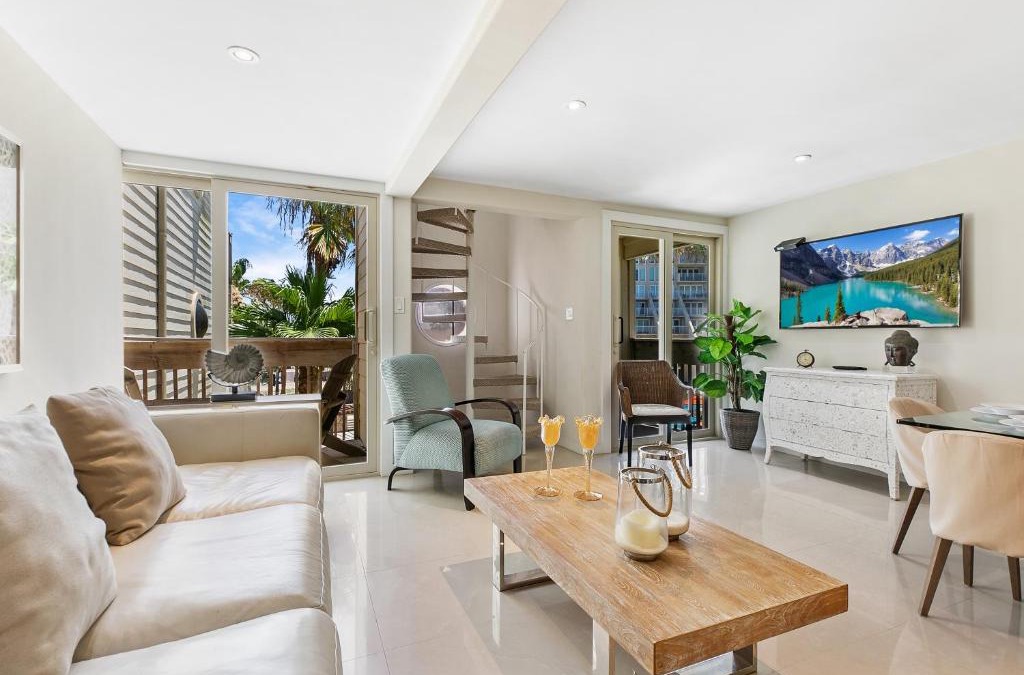 South Padre Island House | The ocean waves are calling! Relaxing setting with pool view in beachfront resort