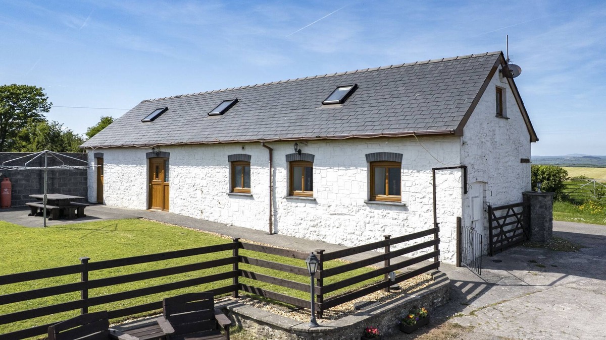 Llanybri Cottage | The Old Cow Barn - a charming and spacious retreat