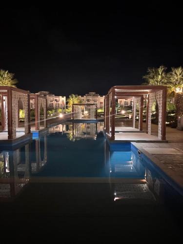 Ad-Dab'ah Apartment | The Pearl Chalet Gaia Resort Ground floor with garden