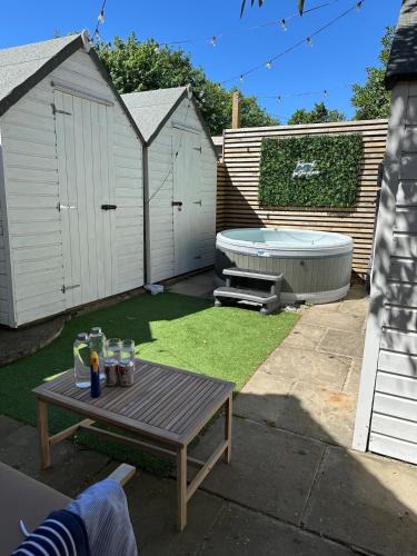 Churchtown House | The Telephone exchange very quaint hot tub stay