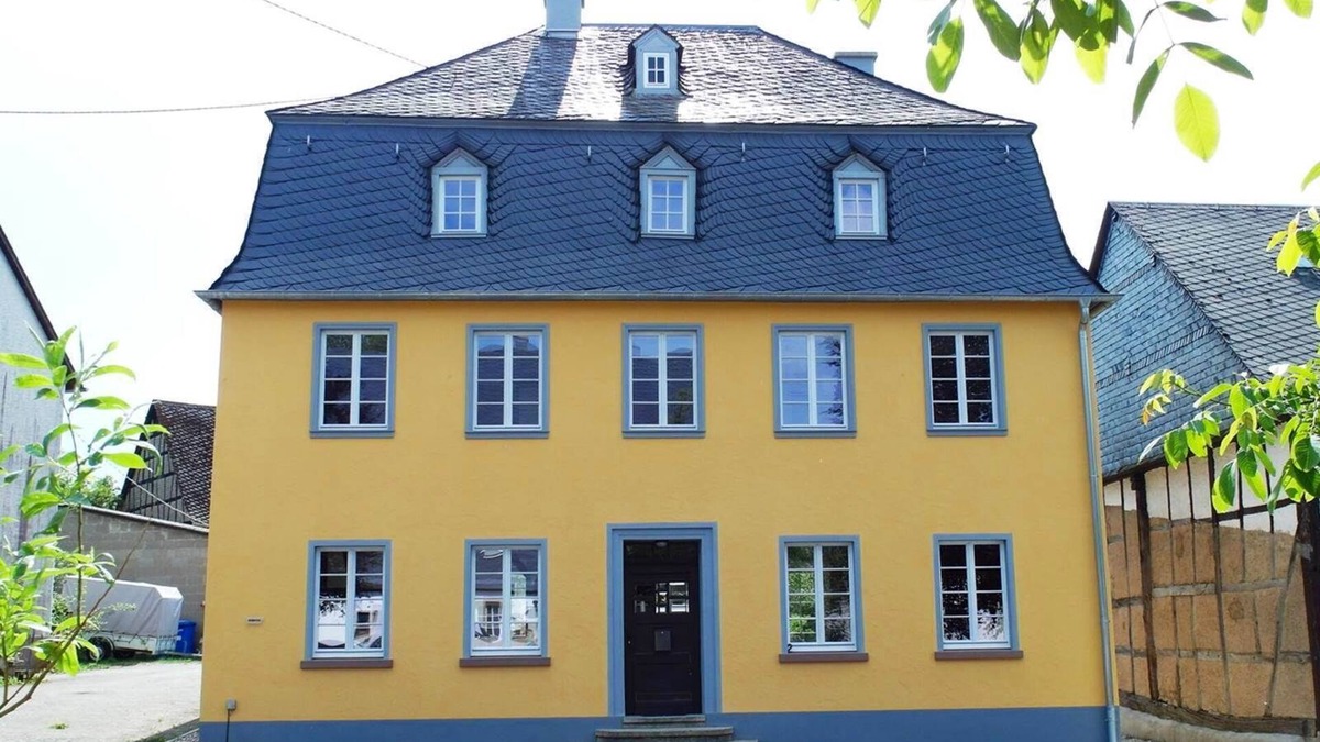 Irmenach House | The yellow vacation home