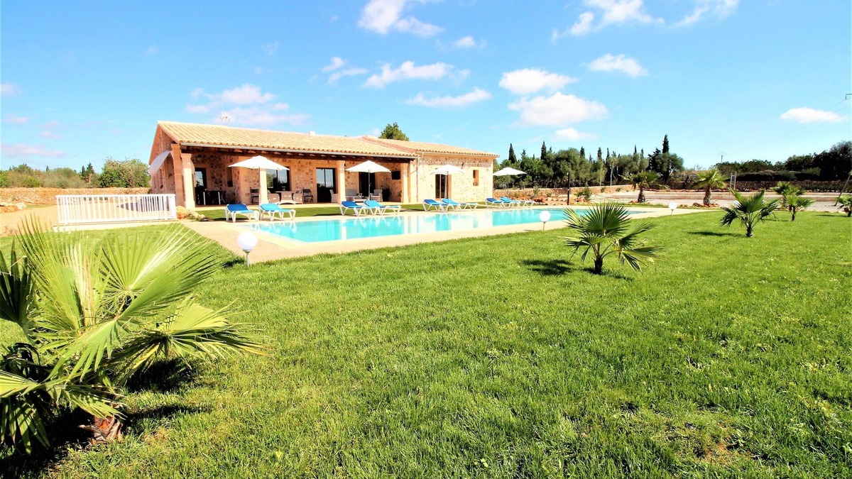 Son Antem House | They are Pieres Nou. modern rustic finca with volley ball court and 15m pool