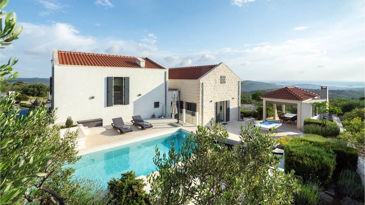 Rogoznica House | This modern and bright vacation home is located in a small village in the hinterland of Rogoznica.
