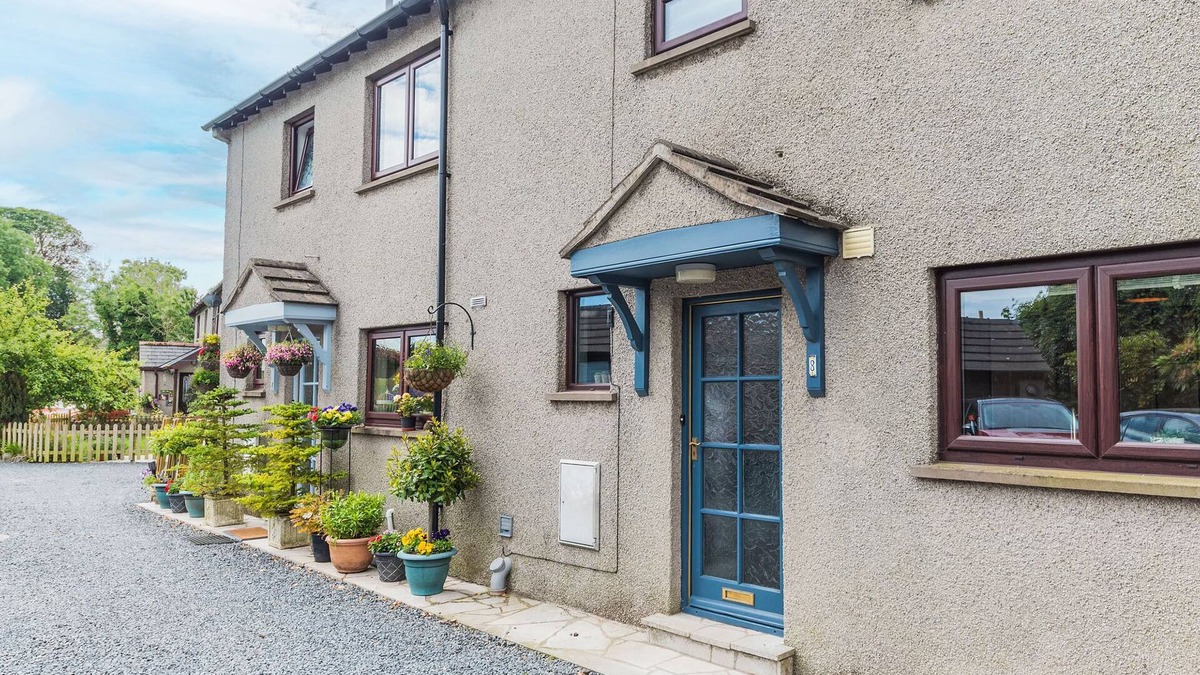 Cark Cottage | This warm and welcoming cottage, with a homely feel, has a balcony where you can watch ducks go by.