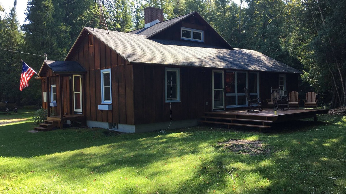 Leland House | Top of North Lake Leelanau - Secluded Lake Cottage w/ dock & sandy bottom