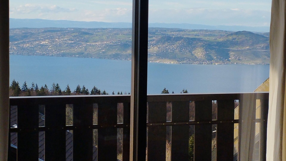Thollon-les-Memises Apartment | Tout Schuss summer and winter Building le SCHUSS Apartment lake view