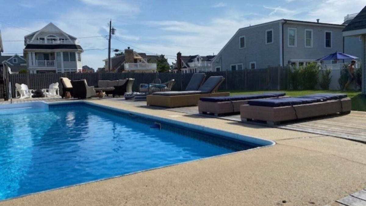 Normandy Beach House | Traditional 5B/2Bath Beach House/ extra large lot across from beach/ heated pool