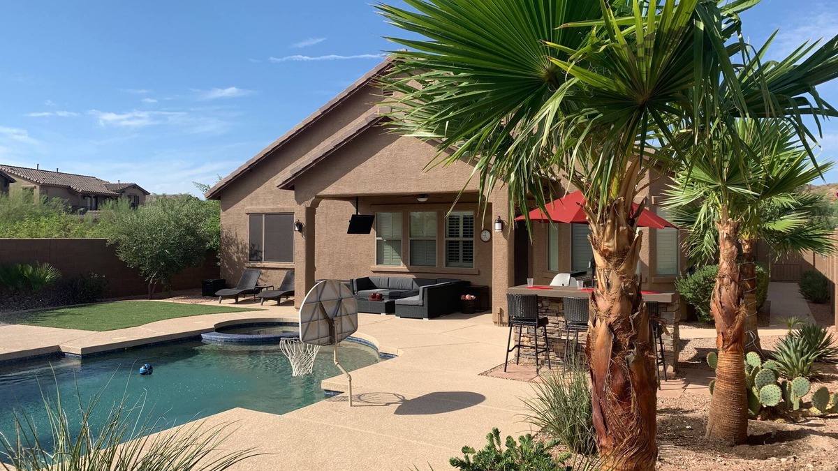 Estrella Mountain Ranch House | Tranquil Backyard with Pool/Spa, BBQ, and Putting Green.