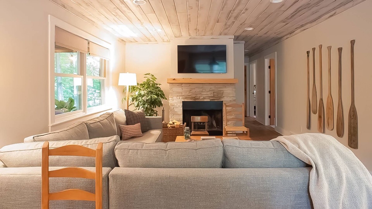 Maple City House | Tree-lined abode with a sprawling deck, large yard, grill, firepit, & central AC