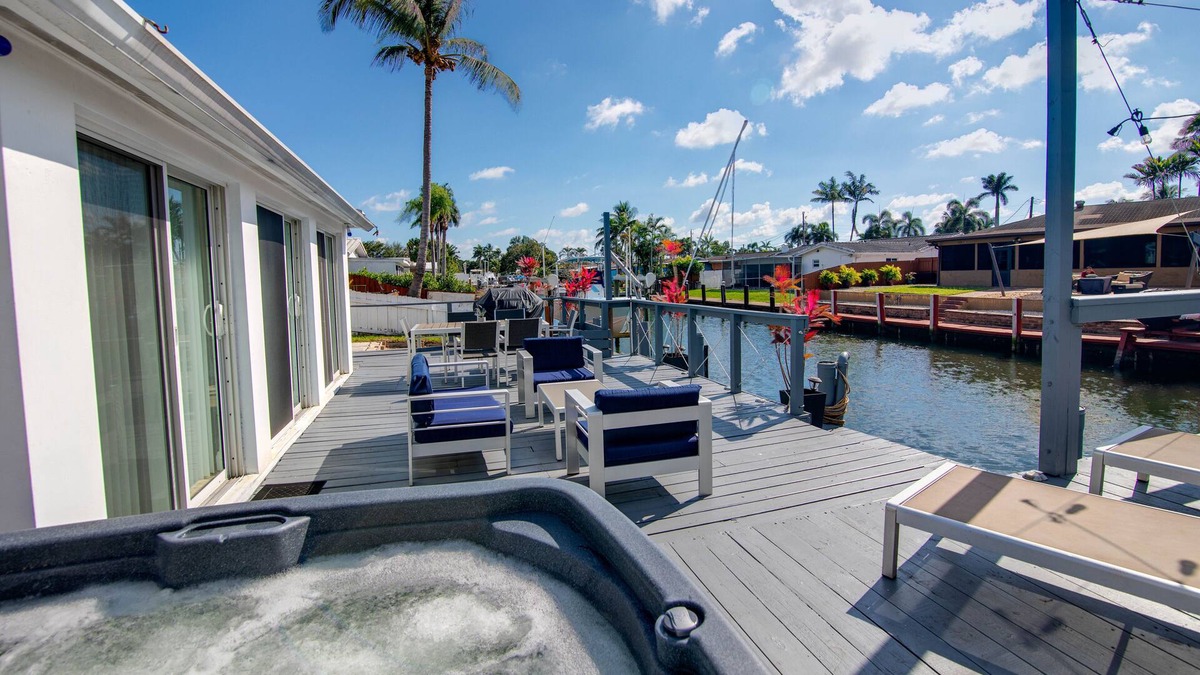 Melaleuca Gardens House | Tropical home with panoramic view of the canal. Fishing getaway near the ocean!