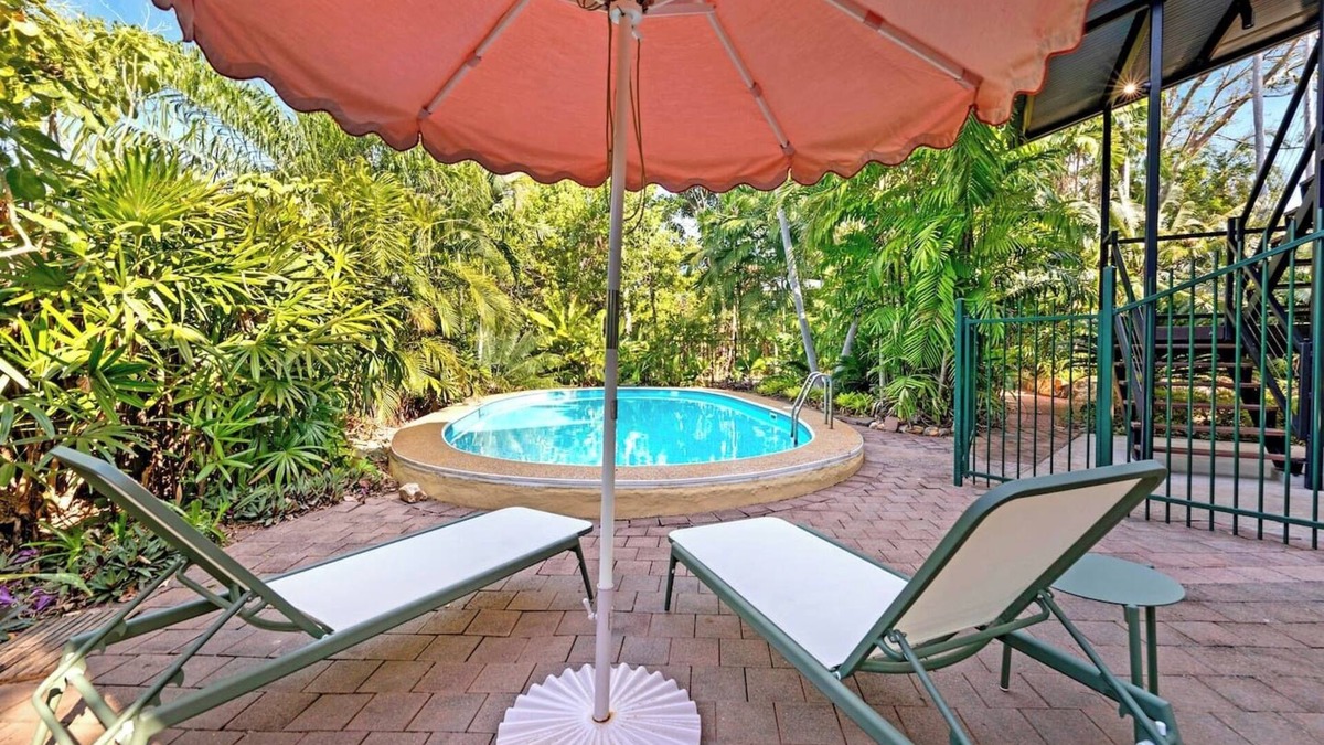 Rapid Creek House | Tropical Luxe Treehouse Lush Poolside Living