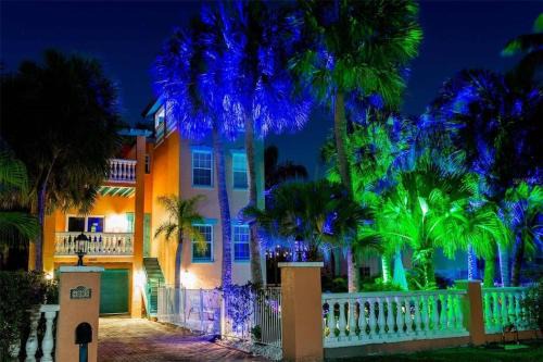 Holmes Beach House | Tropical luxury pool home by the beach with roof top lounge centrally located on Anna Maria Island
